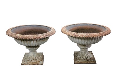 Lot 645 - A pair of Victorian white painted cast iron garden urns