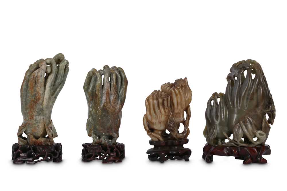 Lot 747 - FOUR CHINESE JADE 'FINGER CITRON' CARVINGS.
