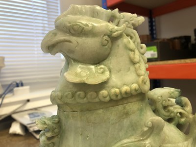 Lot 84 - A CHINESE APPLE-GREEN JADEITE 'DRAGON AND PHOENIX' VESSEL AND COVER.