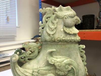 Lot 84 - A CHINESE APPLE-GREEN JADEITE 'DRAGON AND PHOENIX' VESSEL AND COVER.