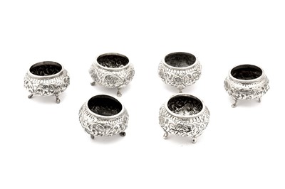 Lot 201 - A set of six early 20th century Anglo – Indian unmarked silver salts, Cutch circa 1900