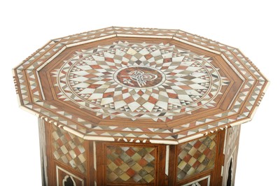 Lot 821 - λ A MOTHER-OF-PEARL AND TORTOISE SHELL-INLAID OCCASIONAL TABLE WITH TUGHRA