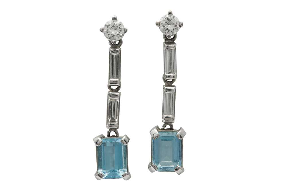 Lot 1254 - A pair of diamond and aquamarine earrings