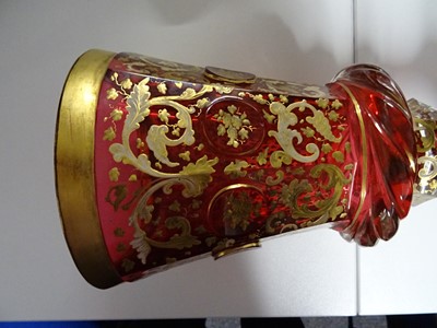 Lot 82 - A late19th century Bohemian ruby and gilt glass goblet and cover