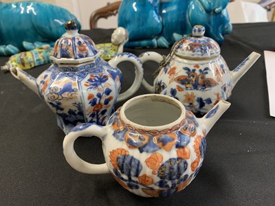 Lot 513 - FIVE CHINESE TEAPOTS AND COVERS AND TEA CADDIES.