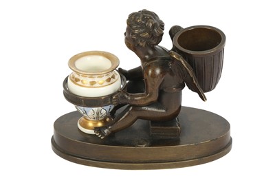 Lot 171 - A PATINATED BRONZE ENCRIER IN THE FORM OF A SEATED WINGED CHERUB, 19TH CENTURY