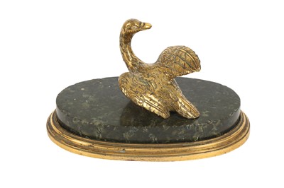 Lot 173 - A GILT BRONZE AND SERPENTINE MARBLE PAPER WEIGHT, 19TH CENTURY