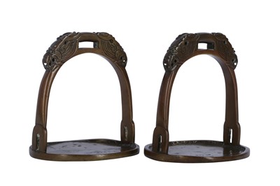 Lot 504 - A PAIR OF CHINESE BRONZE STIRRUPS.