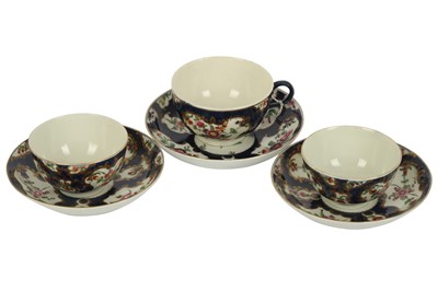 Lot 27 - A near pair of 18th century Worcester porcelain tea bowls and saucers