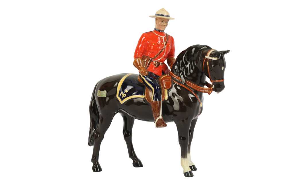 Lot 262 - A BESWICK MODEL OF A CANADIAN MOUNTED POLICEMAN