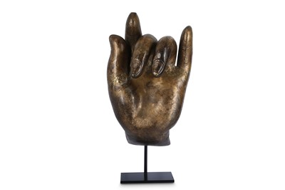 Lot 410 - A LARGE GILT-BRONZE MODEL OF A HAND.