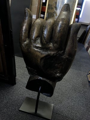 Lot 410 - A LARGE GILT-BRONZE MODEL OF A HAND.