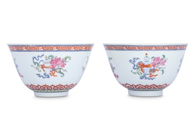 Lot 293 - A PAIR OF CHINESE FAMILLE ROSE 'BAJIXIANG' CUPS.