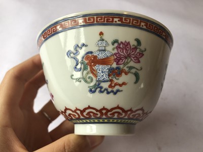 Lot 293 - A PAIR OF CHINESE FAMILLE ROSE 'BAJIXIANG' CUPS.