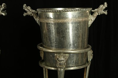 Lot 65 - A PAIR OF 20TH CENTURY SILVERED METAL CHAMPAGNE BUCKETS ON STANDS