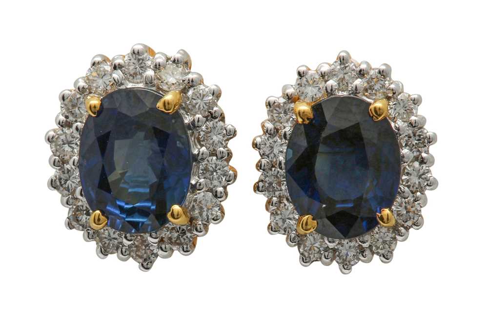 Lot 1263 - A pair of sapphire and diamond earstuds