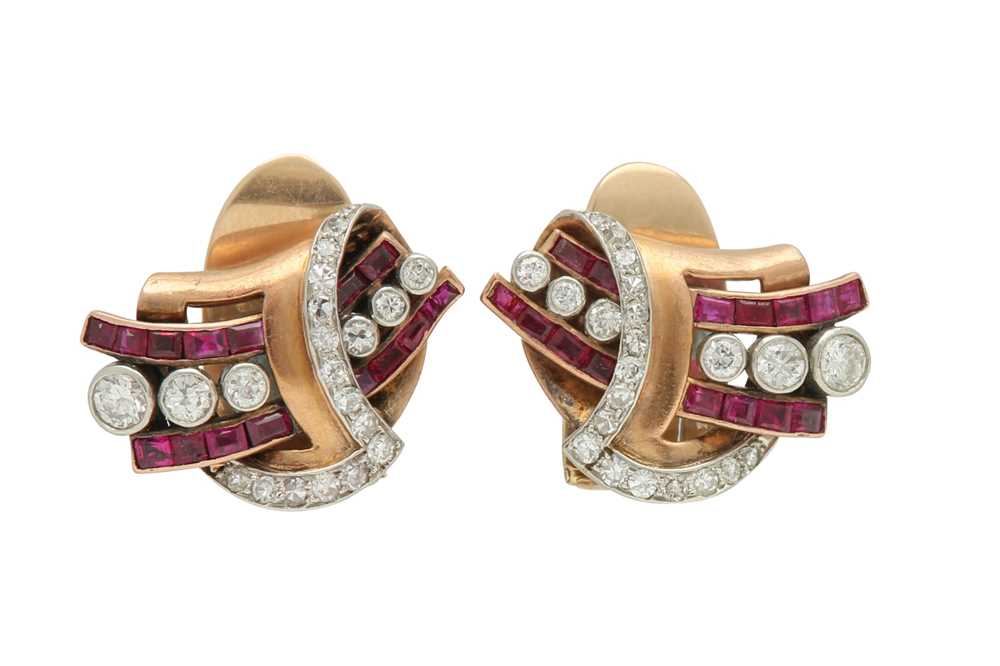 Lot 1311 - A pair of ruby and diamond earclips, circa 1940