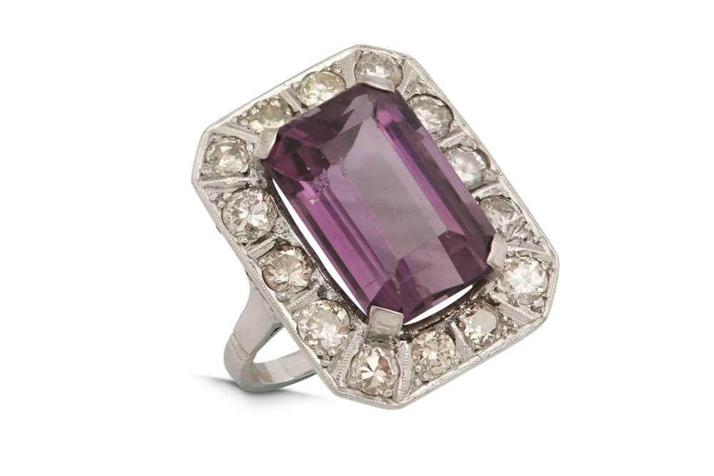 Lot 1315 - An amethyst and diamond plaque ring