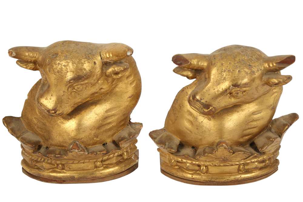 Lot 519 - Two 19th century giltwood armorial crest figures