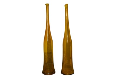 Lot 147 - A pair of 'Shifa' amber glass bottle vases