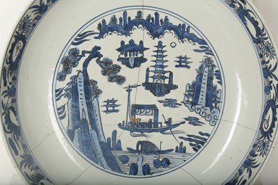 Lot 942 - A LARGE CHINESE-REVIVAL BLUE AND WHITE POTTERY CHARGER