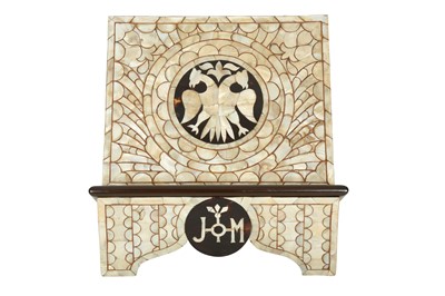 Lot 896 - λ A 20TH CENTURY MOTHER-OF-PEARL AND FAUX TORTOISESHELL-INLAID WOODEN BIBLE STAND