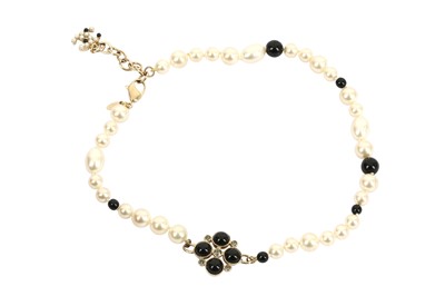 Lot 1207 - Chanel Pearl and Black Bead Necklace