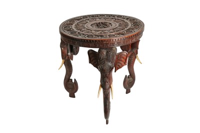 Lot 328 - λ A Carved Rosewood Anglo-Indian Elephant Low Table