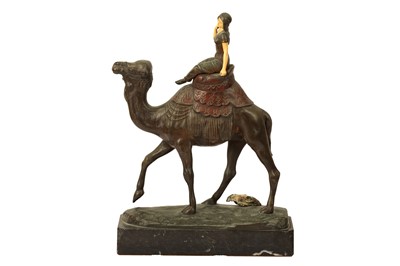Lot 866 - λ AN EARLY 20TH CENTURY PATINATED AND COLD PAINTED BRONZE ORIENTALIST FIGURE