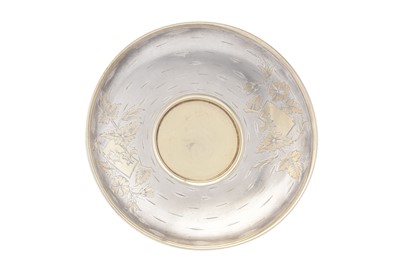 Lot 169 - A Nicholas II Russian 84 zolotnik (875 standard) parcel gilt silver saucer, Moscow 1890 by Fedor Kirillovich Yartsev (active 1881-1896)
