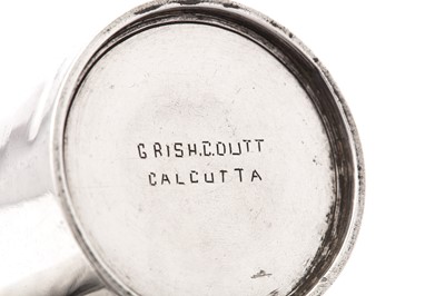 Lot 180 - A late 19th century Indian Colonial silver presentation beaker, Calcutta circa 1888 by Grish Chunder Dutt (active 1872 - 1947)