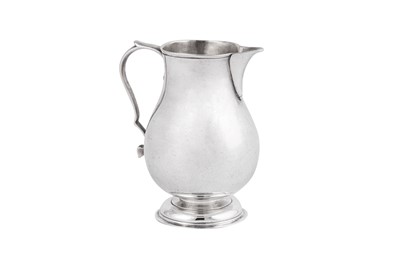 Lot 295 - A George II sterling silver ‘sparrow beak’ cream jug, London 1733 by William Darker (reg. April 1731)
