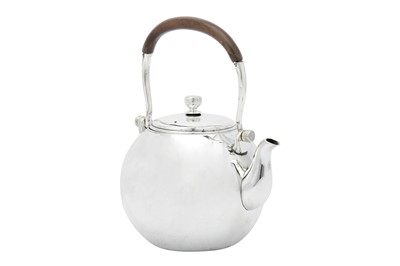 Lot 244 - An early to mid-20th century Japanese silver teapot, circa 1940