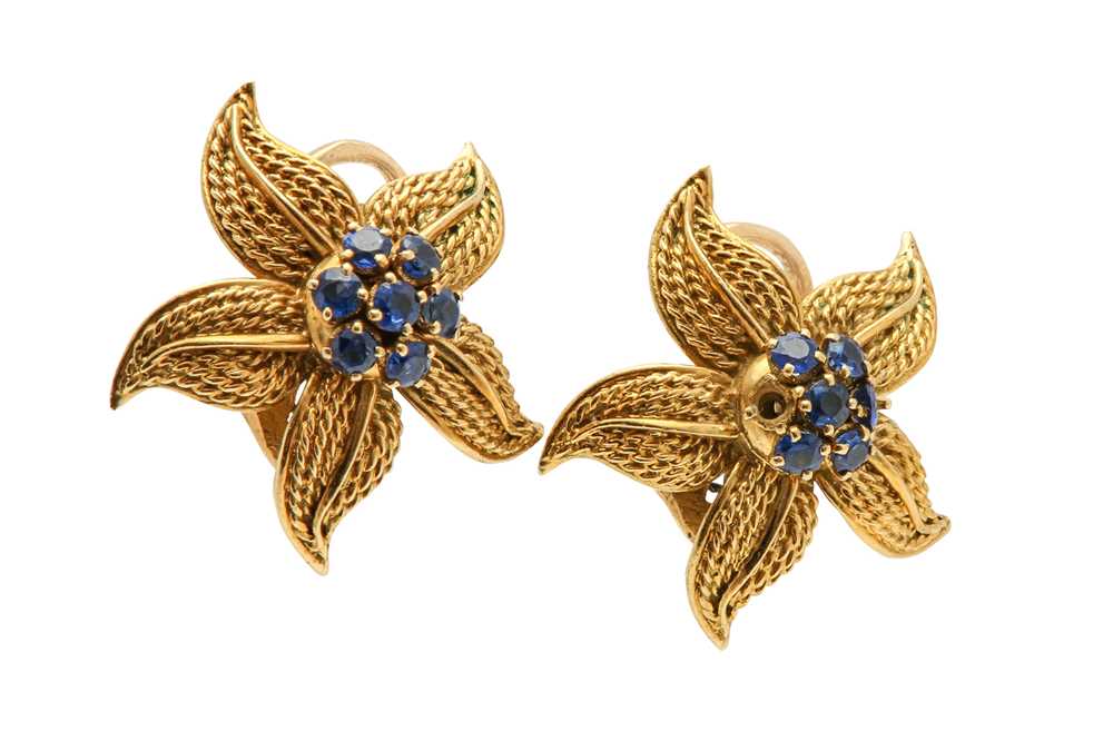 Lot 1302 - Verger Frères | A pair of sapphire flower earclips, circa 1960