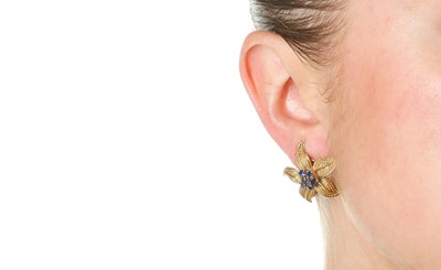 Lot 1302 - Verger Frères | A pair of sapphire flower earclips, circa 1960