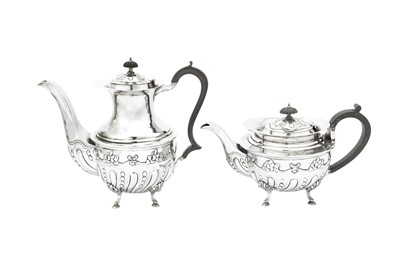 Lot 8 - An Edwardian sterling silver four-piece tea and coffee service, Birmingham 1905 by Mappin and Webb