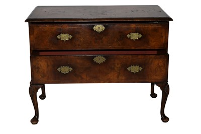 Lot 650 - A George II figured walnut chest on stand