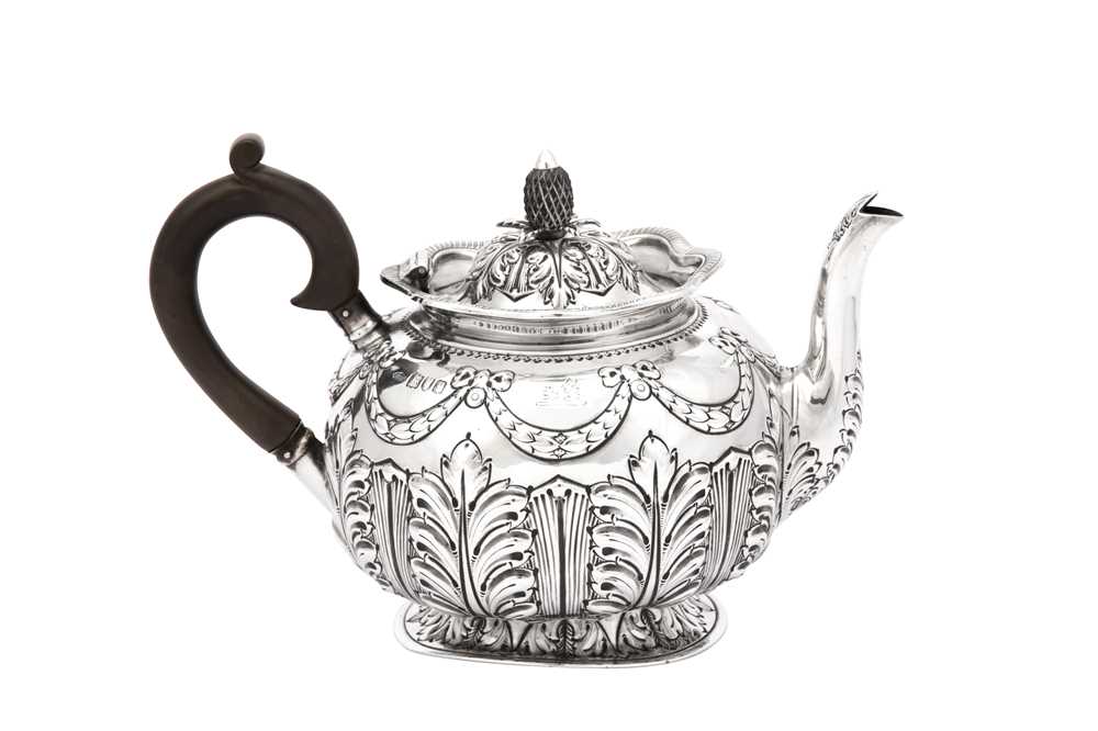Lot 1 - An Edwardian sterling silver teapot, London 1901 by Sibray, Hall & Co Ltd