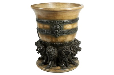 Lot 157 - AN EARLY 20TH CENTURY ITALIAN TERRACOTTA JARDINIERE DECORATED WITH LIONS