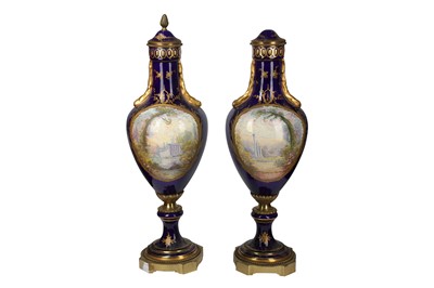 Lot 34 - A pair of late 19th/early 20th century French Sevres style porcelain and gilt metal mounted vases