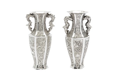 Lot 237 - A pair of early 20th century Chinese Export silver vases, Shanghai circa 1900 retailed by Luen Wo
