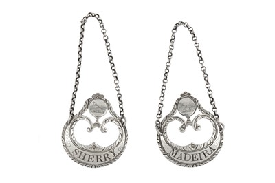 Lot 128 - A pair of George III sterling silver wine labels, London circa 1780 by Hester Bateman