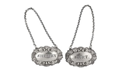 Lot 131 - A pair of William IV sterling silver wine labels, Birmingham 1831 by Matthew Boulton
