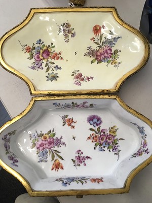 Lot 35 - A late 19th/early 20th French porcelain shaped box, in the Sevres style