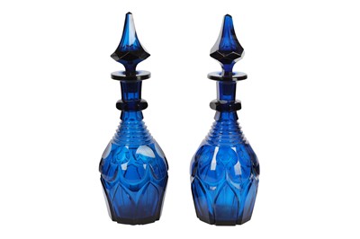 Lot 111 - A pair of late 19th century blue glass decanters with stoppers