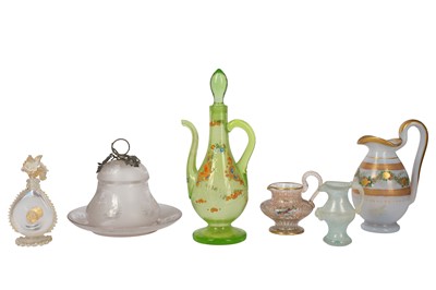 Lot 118 - A late 19th/early 20th century Bohemian green or uranium glass ewer and stopper