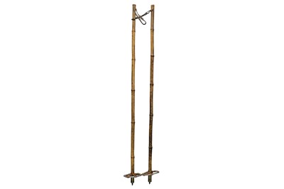 Lot 542 - A pair of Hickory skis along with a pair of bamboo poles