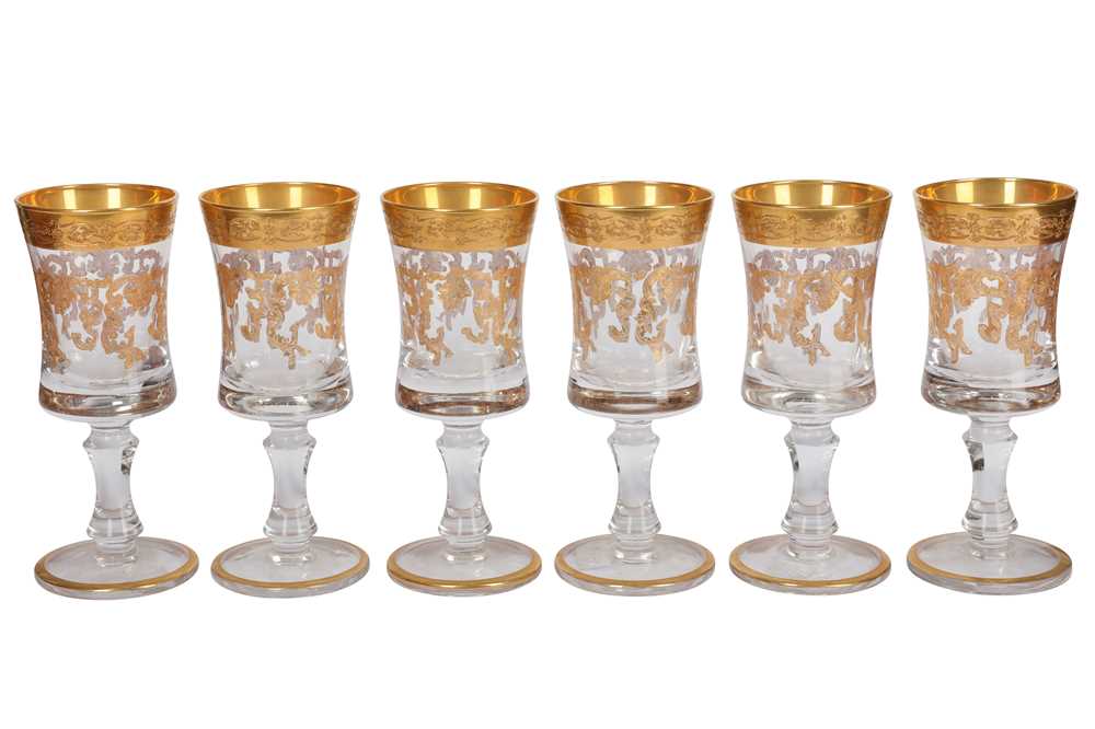 Lot 127 - A set of six Continental glass and gilt glass wine goblets
