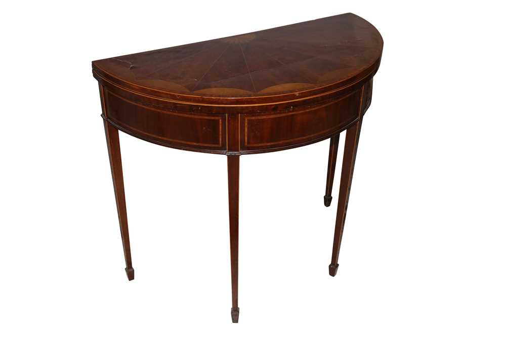 Lot 690 - A Sheraton style mahogany demi lune card table, circa 1900