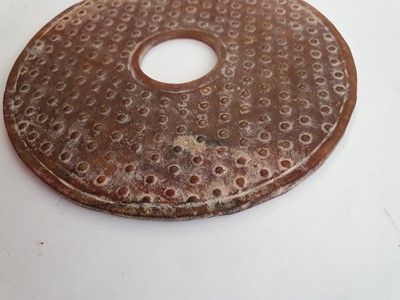 Lot 538 - A CHINESE HARDSTONE CONG AND A BI DISC.